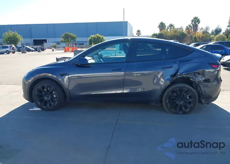 2023 Tesla Model Y Rwd из США, поврежденный, VIN 7SAYGDED5PF980101